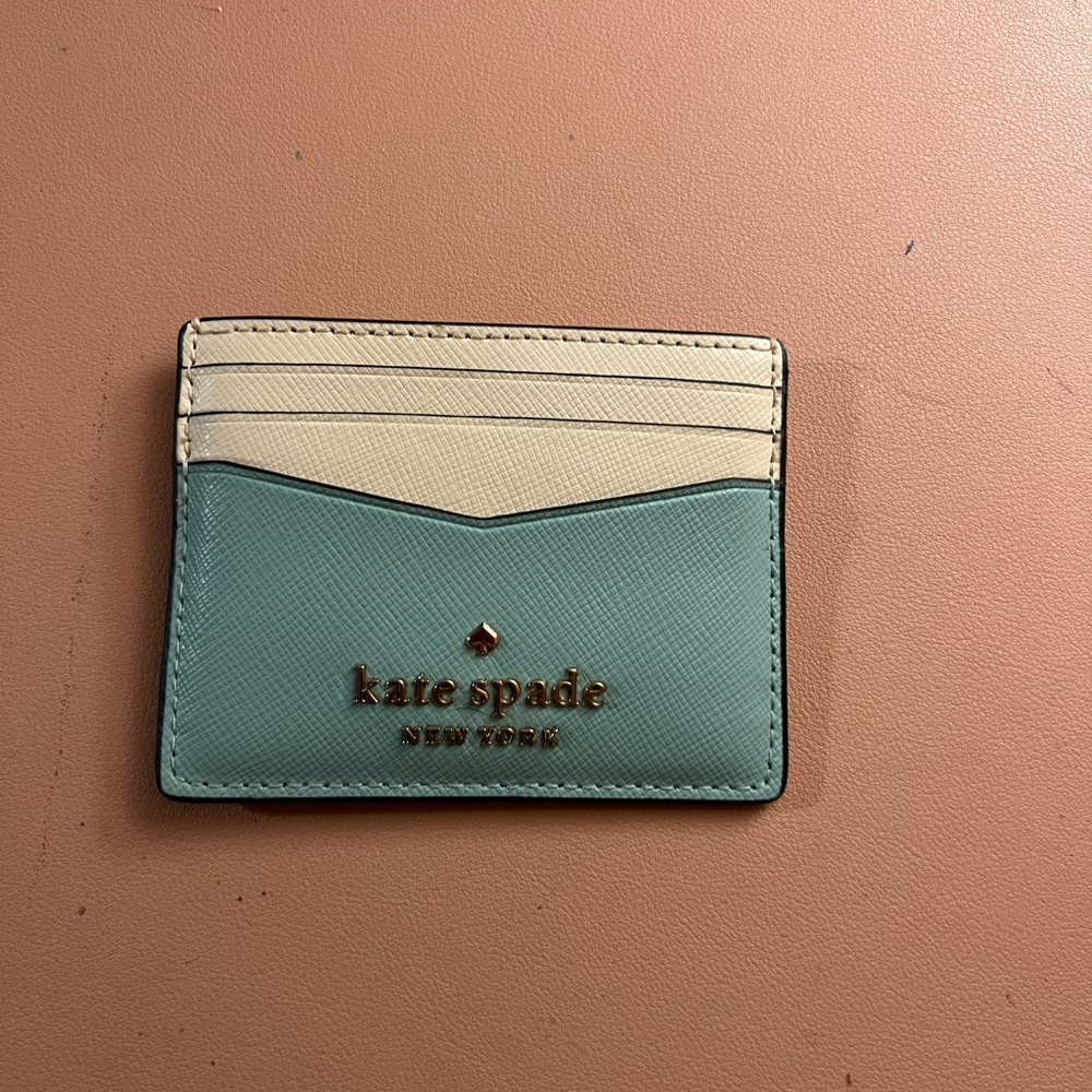 Katie Spade light blue wallet.